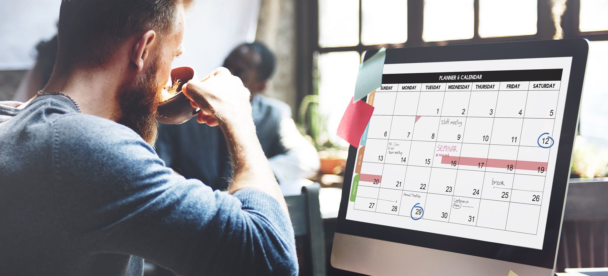 Person looking at calendar on computer screen